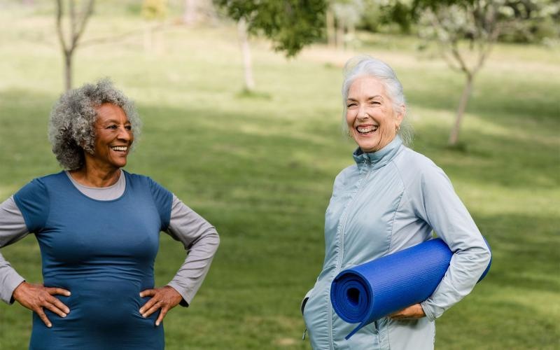 a couple of women doing yoga